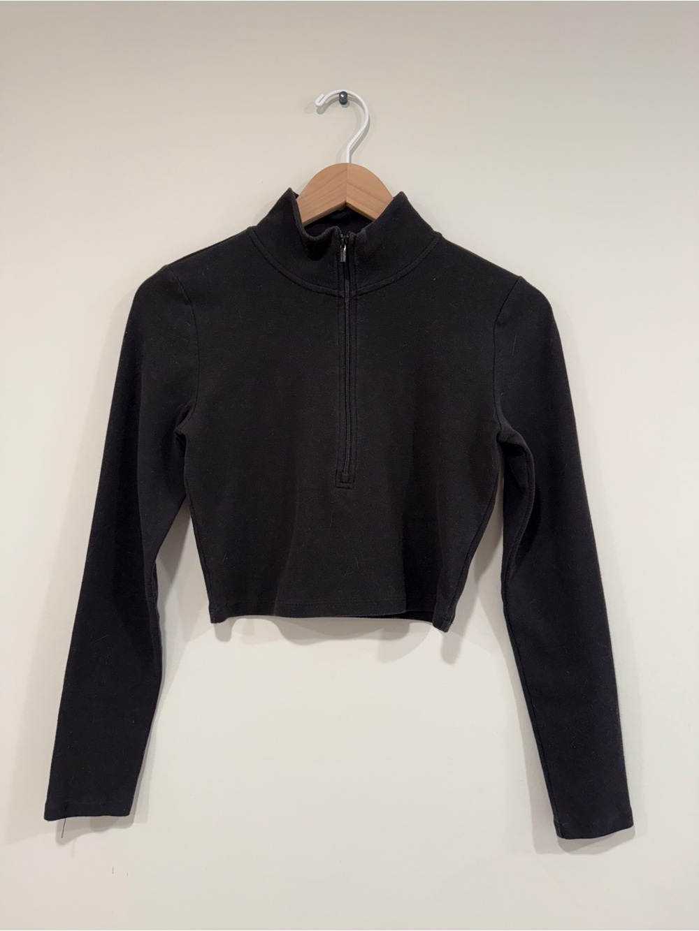 Aritzia’s Sunday Best Black Half-Zip Long Sleeve Top